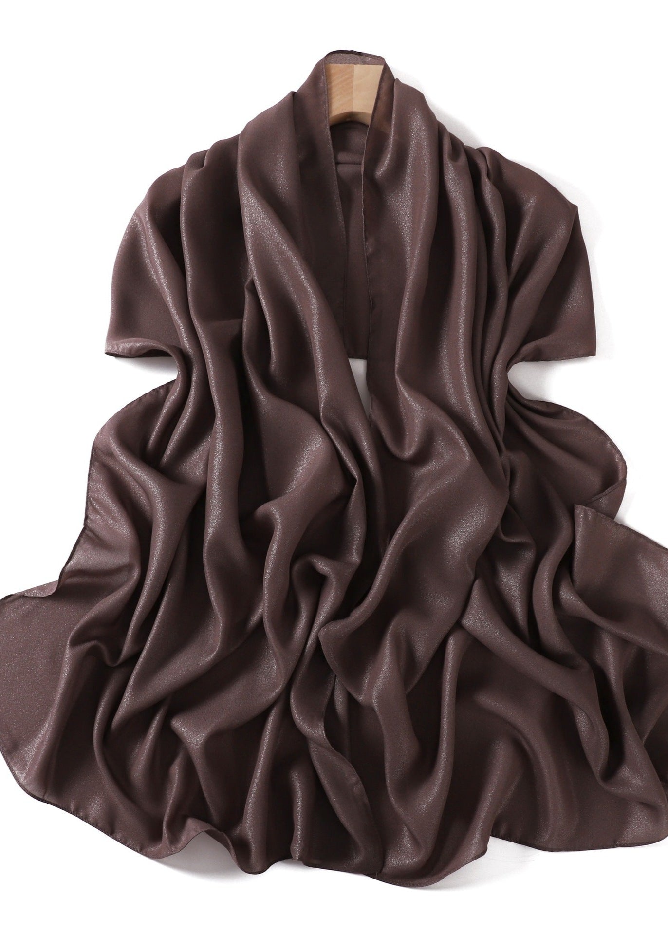 A solid-color flowing chiffon long shawl