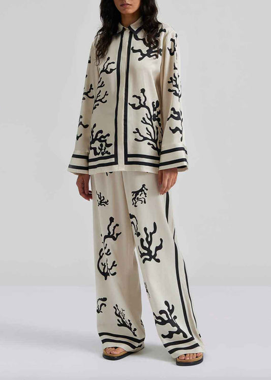 Two loose and casual pieces with printed and color-blocked patterns