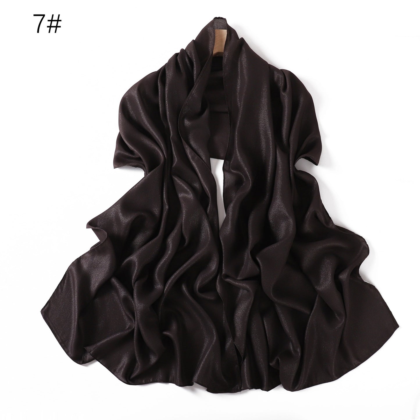 A solid-color flowing chiffon long shawl