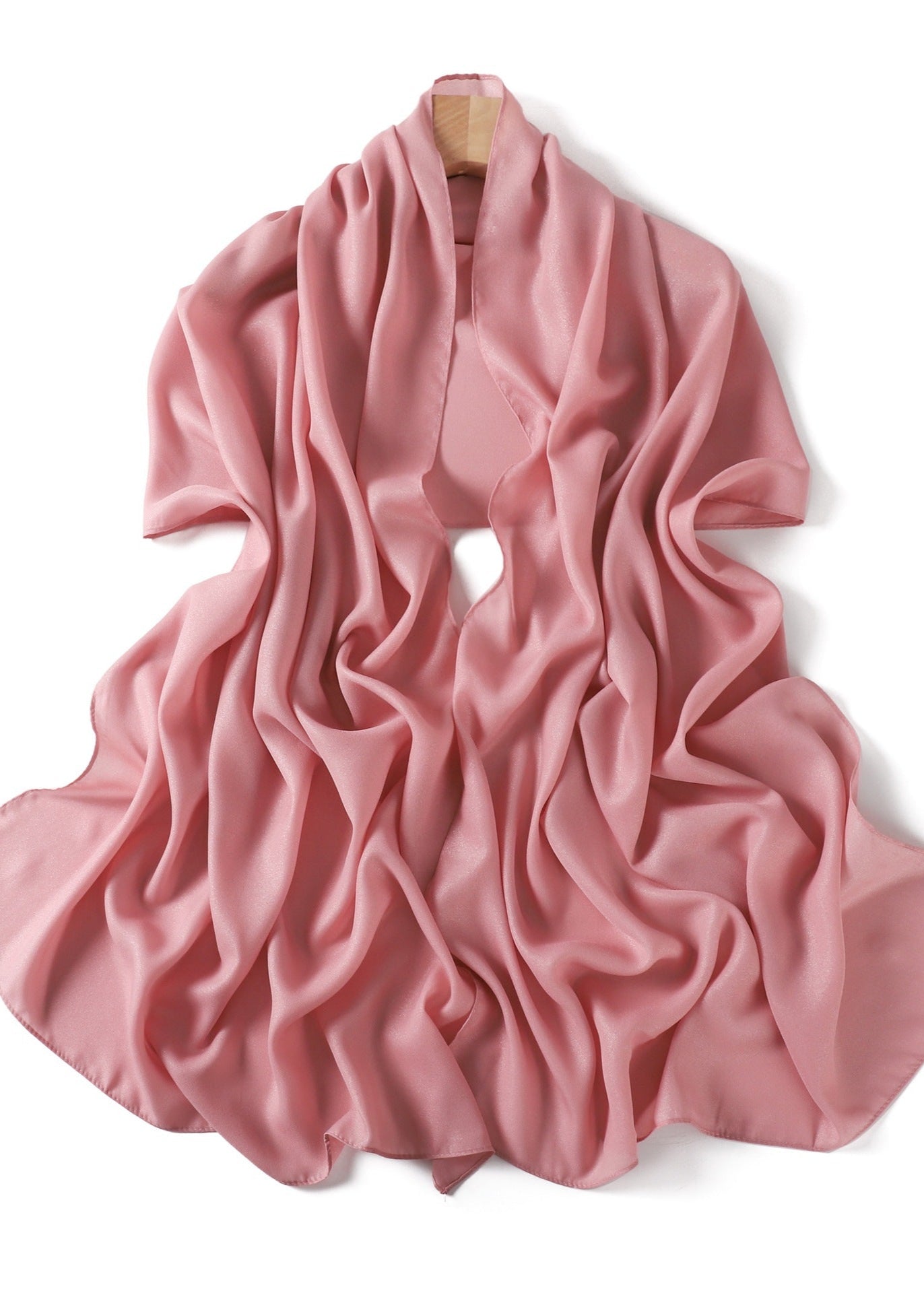 A solid-color flowing chiffon long shawl